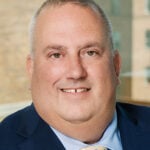 Gregory M. Ewers